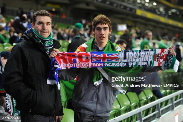 Northern Ireland fans holding a scarf in solidarity with Scottish club Rangers