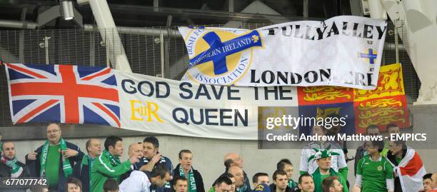 Northern Ireland fans show their solidarity to the British monarchy in the stands