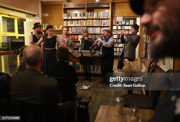 Musicians, including singer Sasha Lurje, violinist Craig Judelman, trumpetist Paul Brody, percussionist Hampus Melin, accordionist Sanne Moericke and...