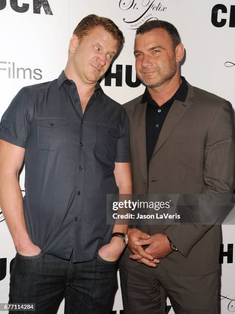Actors Dash Mihok and Liev Schreiber attend the premiere of "Chuck" at ArcLight Cinemas on May 2, 2017 in Hollywood, California.