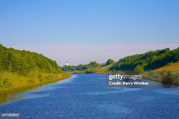 bend in main-danube canal in bavaria, germany - beautiful blue danube stock pictures, royalty-free photos & images