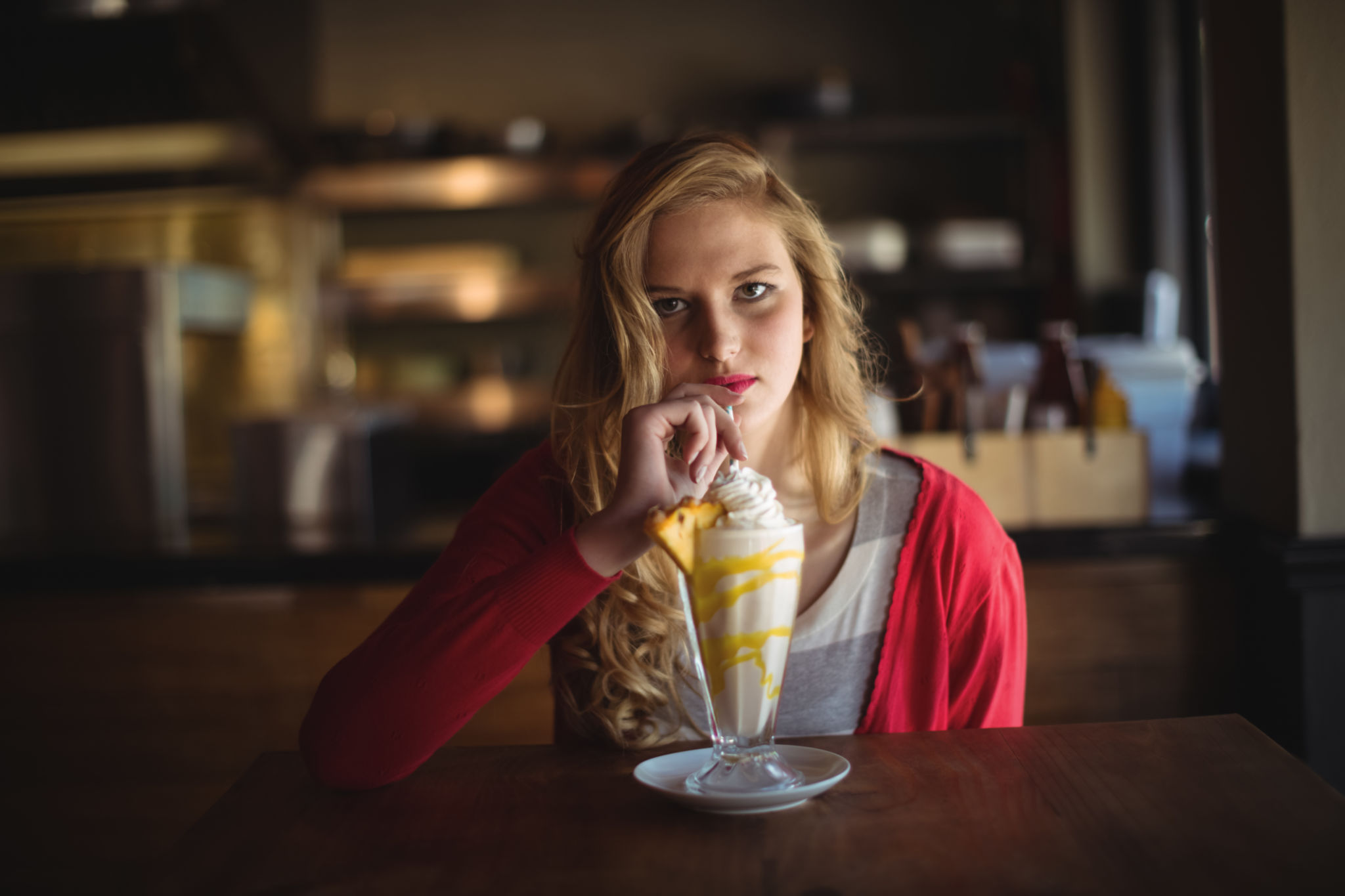 Portrait of beautiful woman having milkshake Portrait of beautiful woman having milkshake
