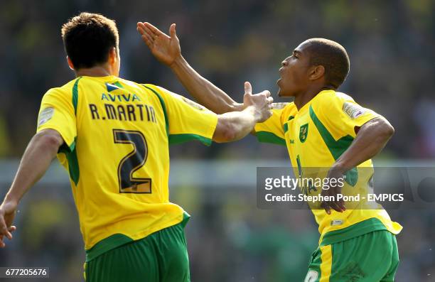 Norwich City's Simeon Jackson celebrates scoring his second goal with team mate Russell Martin