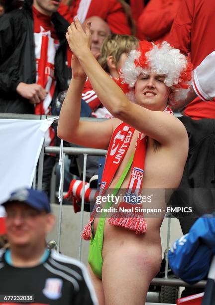 Stoke City fan wears a mankini in the stands.