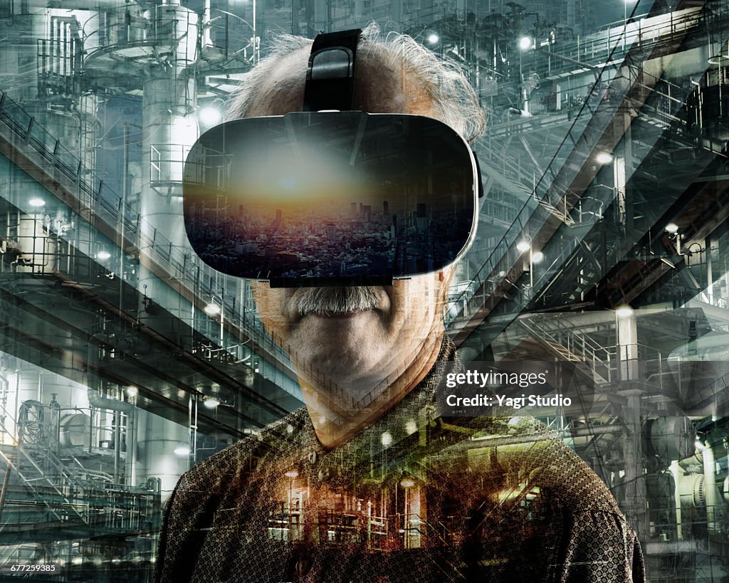 Senior man using a virtual reality headset.
