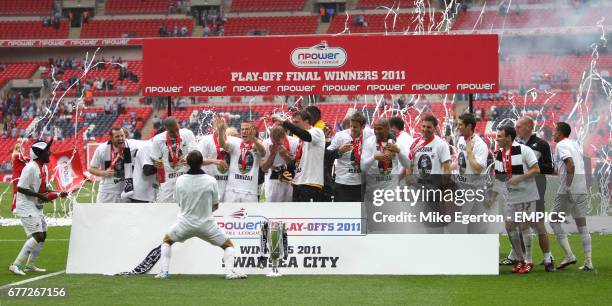 Swansea City celebrate winning the Championship Play Offs