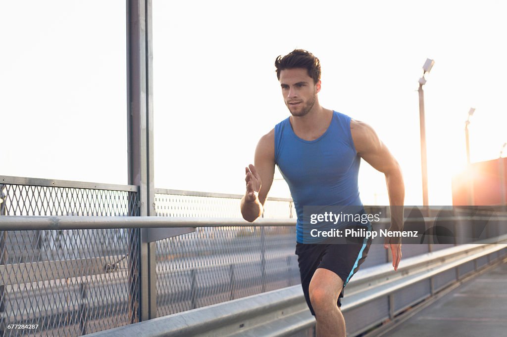 Young men running