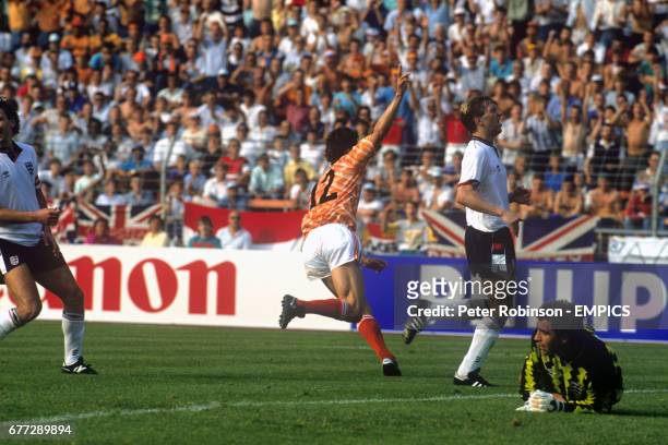 Marco Van Basten celebrates scoring his second goal for the game for the Netherlands as England's Bryan Robson , Gary Stevens and goalkeeper Peter...