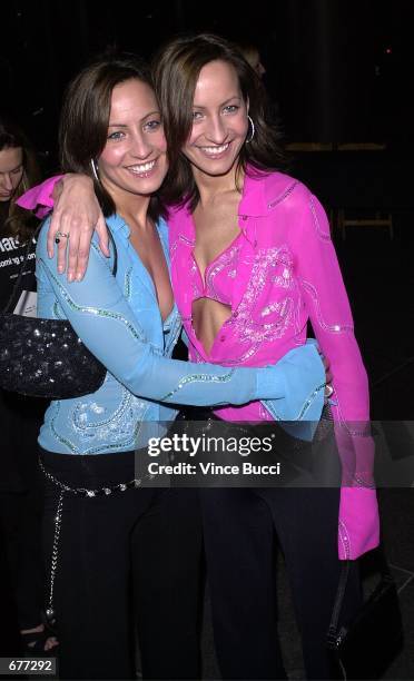 Identical twins-actresses Nikki and Teena Collins arrive for the premiere of the film "Snatch" January 18, 2001 in Hollywood, CA.
