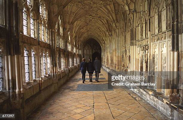 School children walk through The Cloisters at Gloucester Cathedral December 9, 2001 in Gloucester, England. Warner Brothers movie producers will...