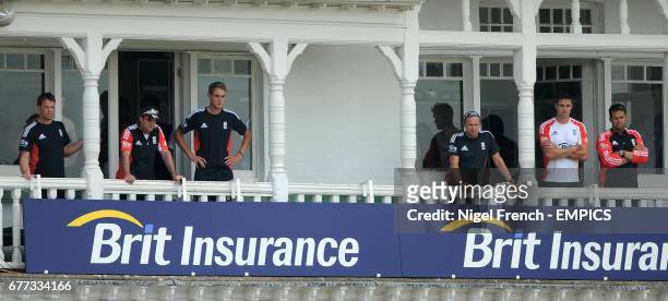 England team balcony watch on as Ian Bell is given run out against India before tea.