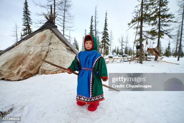 nenets boy in nomadic camp - sami tribe stock pictures, royalty-free photos & images