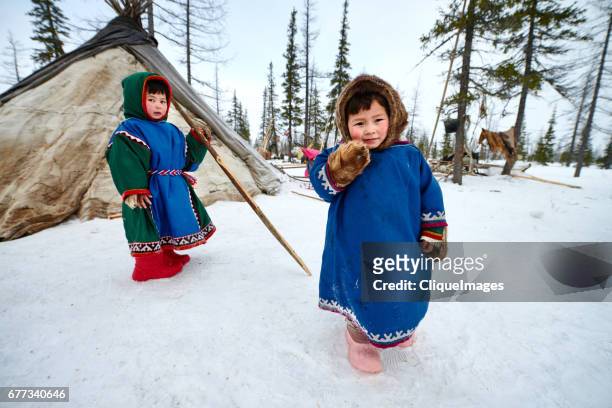 little reindeer herders in camp - nenets stock pictures, royalty-free photos & images