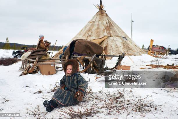nenets child in nomadic camp - nenets stock pictures, royalty-free photos & images