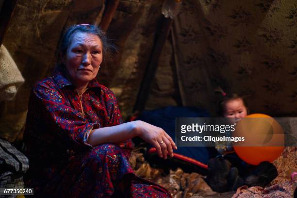 nenets woman and girl in chum - nenets stock pictures, royalty-free photos & images
