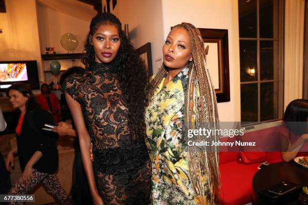 Jessica White and Eva Marcille attend the 2nd Annual Art For Life Los Angeles at a private residence on May 2, 2017 in West Hollywood, California.