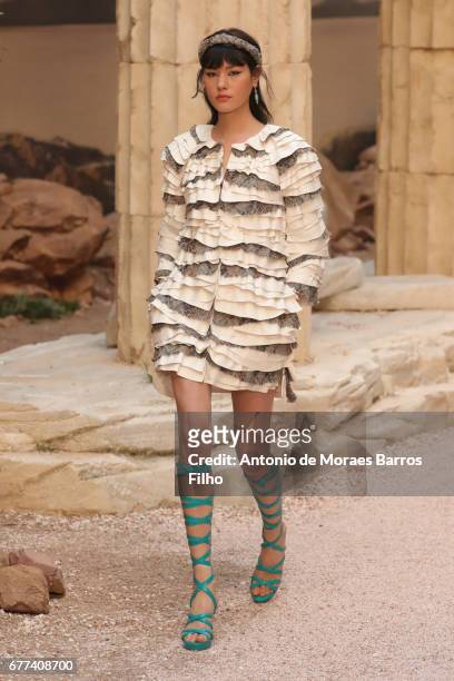 Model walks the runway during the Chanel Cruise show at Grand Palais on May 3, 2017 in Paris, France.