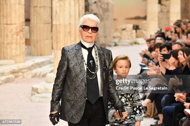 Designer Karl Lagerfeld and nephew Hudson Kroenig walk the runway during Chanel Cruise 2017/2018 Collection at Grand Palais on May 3, 2017 in Paris,...