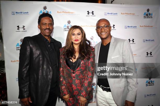 Richard Lawson, Tina Knowles Lawson, and Tommy Davidson attend the 2nd Annual Art For Life Los Angeles at a private residence on May 2, 2017 in West...