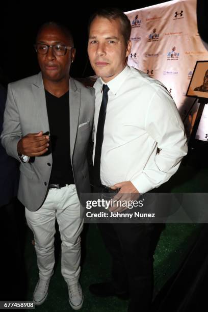 Tommy Davidson and Shepard Fairey attend the 2nd Annual Art For Life Los Angeles at a private residence on May 2, 2017 in West Hollywood, California.