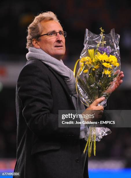 Sweden manager Erik Hamren leaves the field with a bunch of flowers after the game