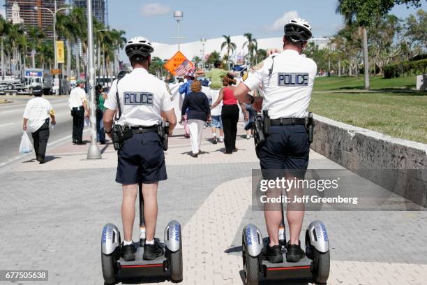 Miami Police riding Segway electric transporter.