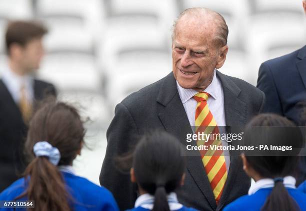 The Duke of Edinburgh talks to school children from St Edwards Catholic Primary School, during a visit to Lord's cricket ground in London where he...