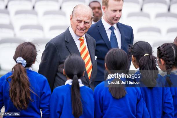 Prince Philip, Duke of Edinburgh escorted by Matthew Fleming, President of Marylebone Cricket Club , meets pupils from St. Edward's Catholic Primary...