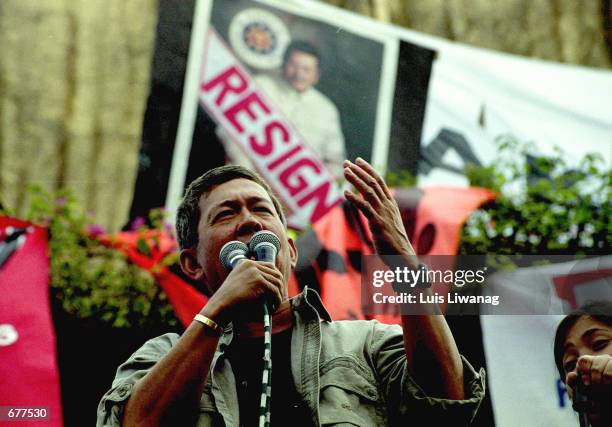 Former Chairman of the controversial Securities and Exchange Commission Perfecto Yasay speaks before tens of thousands of protesters who gathered at...