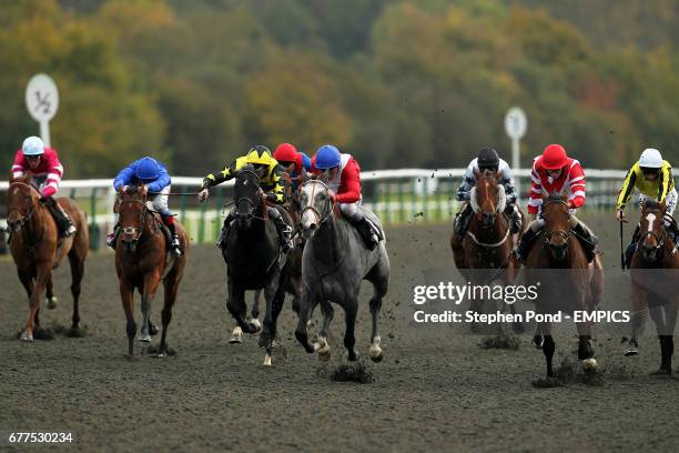 Clinical ridden by jockey Seb Sanders wins the E.B.F. Normandie Stud Fleur De Lys Fillies' Stakes at Lingfield Racecourse