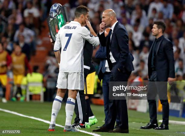Cristiano Ronaldo of Real Madrid speak with Head coach Zinedine Zidane of Real Madrid during the UEFA Champions League semi-final first leg match...