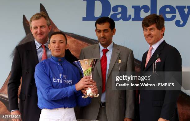 Lanfranco Dettori and trainer Mahmood Al Zarooni are presented with an award after Blue Bunting wins the Darley Yorkshire Oaks