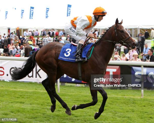 Navajo Chief ridden by jockey Harry Bentley goes to post before the Addleshaw Goddard Stakes