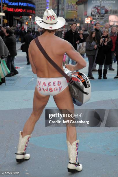 Naked Cowboy street performer in Times Square.