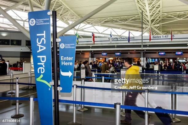 Pre Check, security checkpoint at John F. Kennedy International Airport.