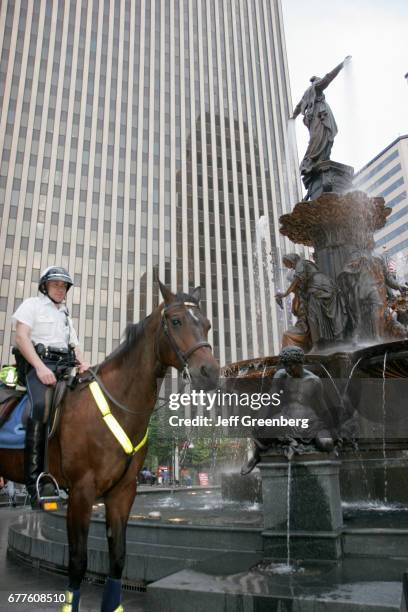 Policeman on horseback at Fountain Square.