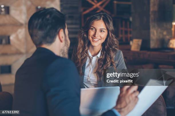 beautiful businesswoman on a meeting - career advice stock pictures, royalty-free photos & images