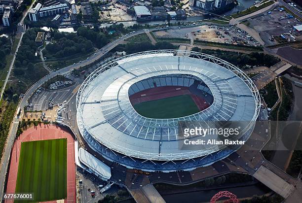 aerial view of the redeveloped olympic stadium - olympic park london stock pictures, royalty-free photos & images