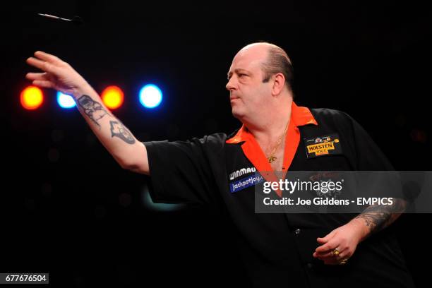 England's Ted Hankey in action against Martin Atkins in the quarter finals of the BDO World Professional Darts Championships
