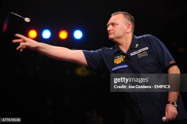 England's Martin Atkins in action against England's Ted Hankey in the quarter finals of the BDO World Professional Darts Championships