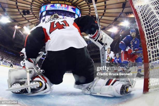 Rick Nash of the New York Rangers moves in on Craig Anderson of the Ottawa Senators in Game Three of the Eastern Conference Second Round during the...