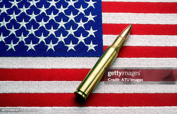 bullet flag - weapon stockfoto's en -beelden