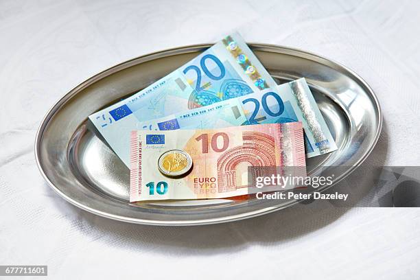 service euro tip - gratuity stock pictures, royalty-free photos & images