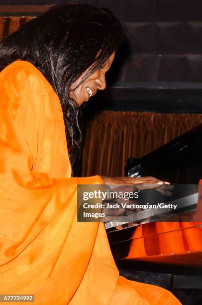 American Jazz musician and composer Alice Coltrane , plays piano with her son Ravi Coltrane's Quartet at Joe's Pub, New York, New York, November 12,...