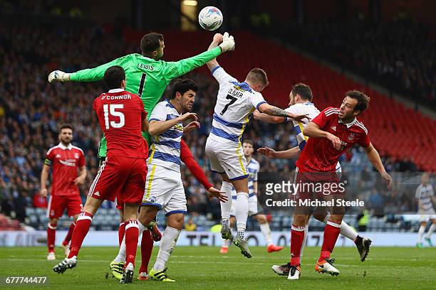 Joe Lewis the goalkeeper of Aberdeen vies for the ball alongside Thomas O'Ware and Gary Oliver of Greenock during the Betfred Cup Semi-Final match...