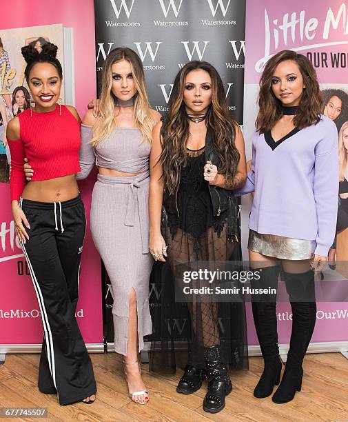 Leigh-Anne Pinnock, Perrie Edwards, Jesy Nelson and Jade Thirlwall of pose as they Little Mix sign copies of their new book 'Our World' at...