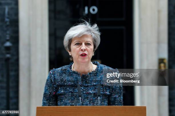 Theresa May, U.K. Prime minister, makes a statement to the media outside number 10 Downing Street after meeting Queen Elizabeth II to mark the...