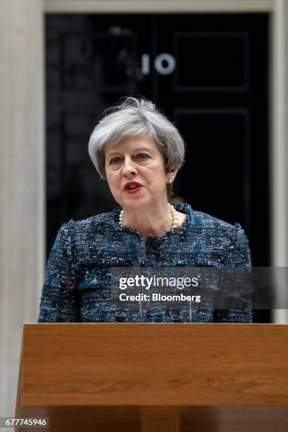 Theresa May, U.K. Prime minister, makes a statement to the media outside number 10 Downing Street after meeting Queen Elizabeth II to mark the...