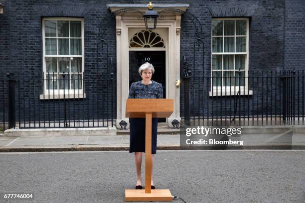 Theresa May, U.K. Prime minister, makes a statement to the media outside number 10 Downing Street after meeting Queen Elizabeth II to mark the...