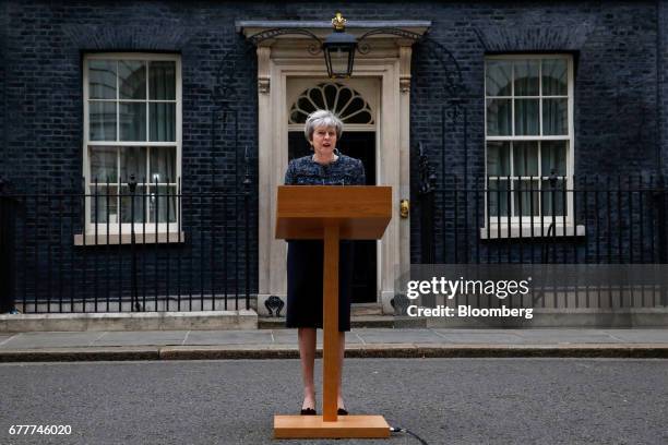 Theresa May, U.K. Prime minister, makes a statement to the media outside number 10 Downing Street after meeting Queen Elizabeth II to mark the...